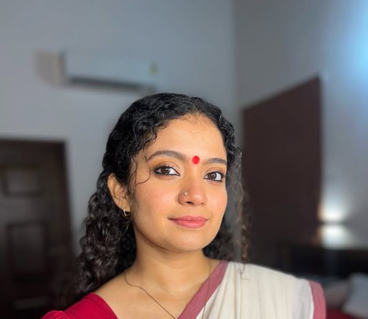 Anna Ben Nayarambalam anna ben in red simple kara set and mundu kerala traditional dress and makeup pics