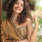 anupama parameswaran in antique gold lehenga Strapless sweetheart neckline corseted choli with vertical panel structuring photos