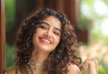 anupama parameswaran in antique gold lehenga Strapless sweetheart neckline corseted choli with vertical panel structuring photos