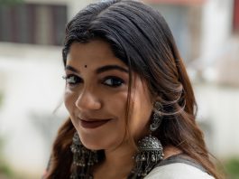 Aparna Balamurali aparna balamurali in classic off white traditional saree embellished with delicate red polka dot motifs and a contrasting black border photos