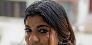 Aparna Balamurali aparna balamurali in classic off white traditional saree embellished with delicate red polka dot motifs and a contrasting black border photos