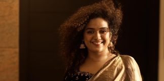 Marina Michael Kurisingal mareena michael kurisingal in golden saree with contrast blouse ideas photos