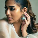nayanthara in full white sleeveless churidar with matching jimikki styling ideas photos