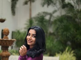 Rajisha Vijayan rajisha vijayan in deep purple long Anarkali kurta featuring a high round neck full length fitted sleeves dress photos