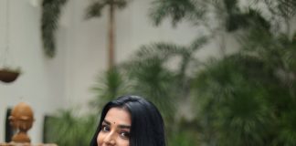 Rajisha Vijayan rajisha vijayan in deep purple long Anarkali kurta featuring a high round neck full length fitted sleeves dress photos
