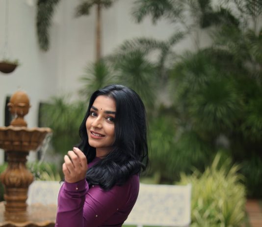 Rajisha Vijayan rajisha vijayan in deep purple long Anarkali kurta featuring a high round neck full length fitted sleeves dress photos