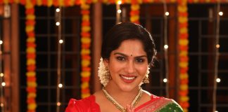 Swasika swasika vijay in green saree with contrast red blouse style design photos