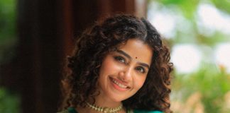 anupama parameswaran in teal blue green long fitted top blouse V neckline and elbow length sleeves with patterned cuffs Lehenga Set photos