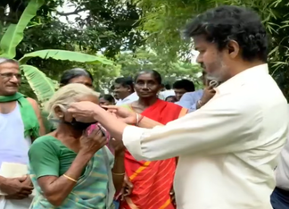 CM Vijay Gifts His Luxury Sunglasses to Elderly Woman Who Walked Him Out CM Vijay Gifts His Luxury Sunglasses to Elderly Woman price