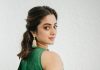 namitha pramod in rich emerald green fabric with a subtle sheen characteristic of fine silk saree Paired with a matching sleeveless round neck blouse photos