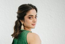 namitha pramod in rich emerald green fabric with a subtle sheen characteristic of fine silk saree Paired with a matching sleeveless round neck blouse photos