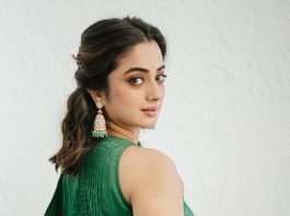 Namitha Pramod namitha pramod in rich emerald green fabric with a subtle sheen characteristic of fine silk saree Paired with a matching sleeveless round neck blouse photos