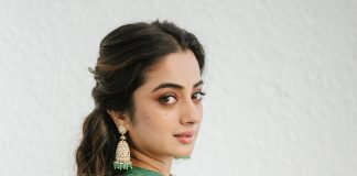 Namitha Pramod namitha pramod in rich emerald green fabric with a subtle sheen characteristic of fine silk saree Paired with a matching sleeveless round neck blouse photos