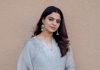nikhila vimal in pastel gray traditional Indian Anarkali set photos