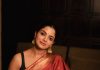 nikhila vimal in rich maroon red saree with Dark emerald green or forest green blouse styling photos