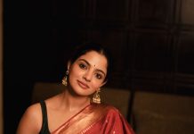 nikhila vimal in rich maroon red saree with Dark emerald green or forest green blouse styling photos