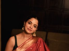 nikhila vimal in rich maroon red saree with Dark emerald green or forest green blouse styling photos