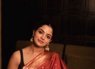 nikhila vimal in rich maroon red saree with Dark emerald green or forest green blouse styling photos