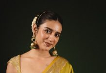 priya varrier in mustard yellow hue with a glossy silk saree heavily embellished sleeveless corset or bustier style blouse ideas photos