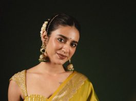 Priya Warrier priya varrier in mustard yellow hue with a glossy silk saree heavily embellished sleeveless corset or bustier style blouse ideas photos