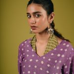 priya varrier in violet long length top with palazzo pants outfit photos