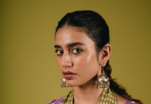 Priya Warrier priya varrier in violet long length top with palazzo pants outfit photos
