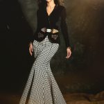 sreeleela in luxurious black velvet jacket featuring a sharp V neckline Cinctured at the waist with a statement geometric belt photos