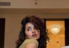 anupama parameswaran in Olive green sleeveless fitted crop top with Light wash denim jeans Features standard belt loops silver button or rivet hardware style photos