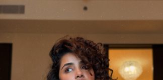 Anupama Parameshwaran anupama parameswaran in Olive green sleeveless fitted crop top with Light wash denim jeans Features standard belt loops silver button or rivet hardware style photos