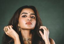 anupama parameswaran in bottle green strapless corset top with structured vertical boning channels and fitted body con pre draped skirt with center front knotting design photos