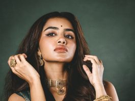 anupama parameswaran in bottle green strapless corset top with structured vertical boning channels and fitted body con pre draped skirt with center front knotting design photos