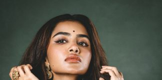 anupama parameswaran in bottle green strapless corset top with structured vertical boning channels and fitted body con pre draped skirt with center front knotting design photos
