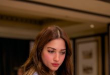 tamanna in long layered gold chain necklace Chunky metallic cuffs or bangles photos